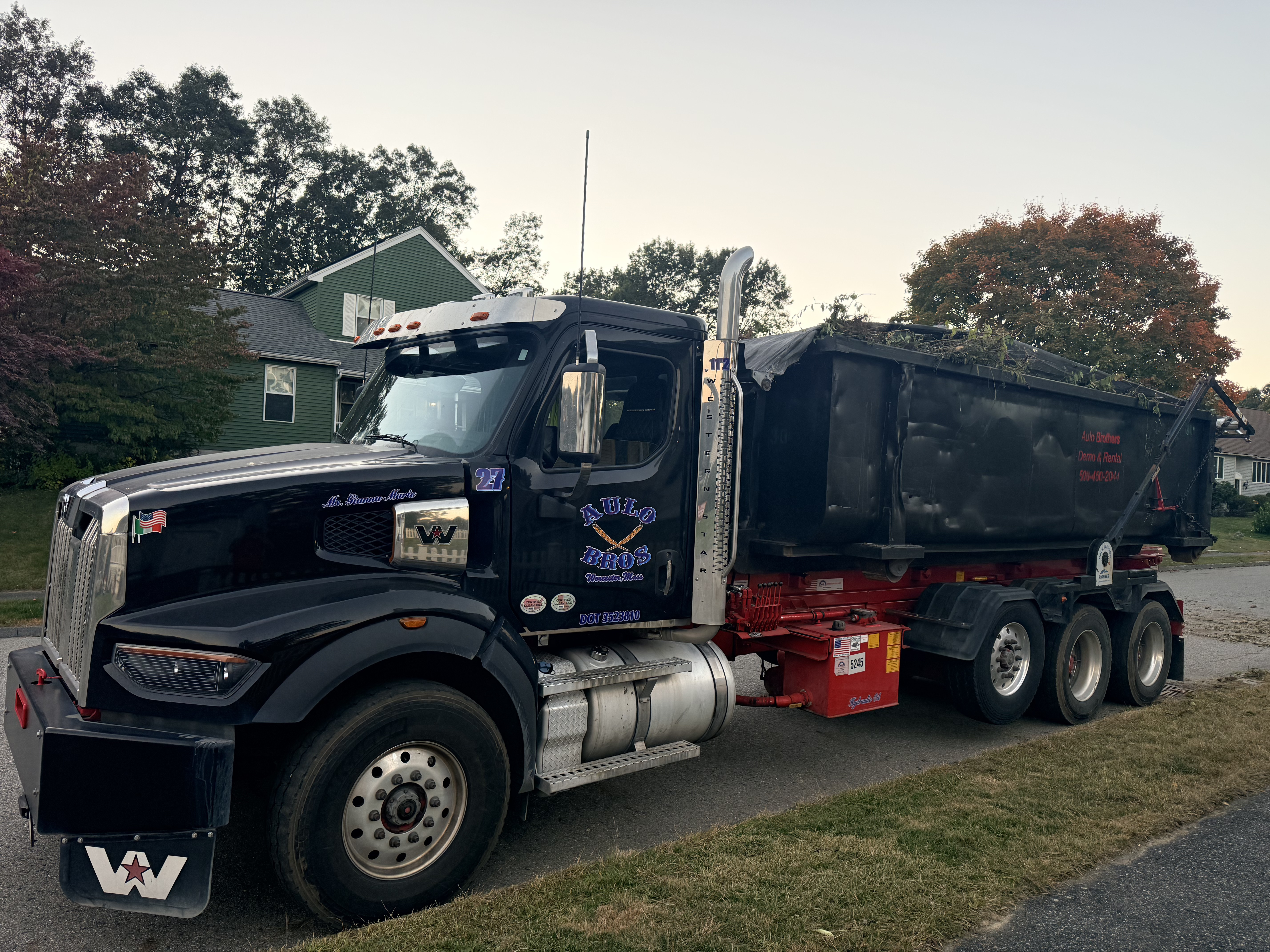 Roll-off dumpster on job site